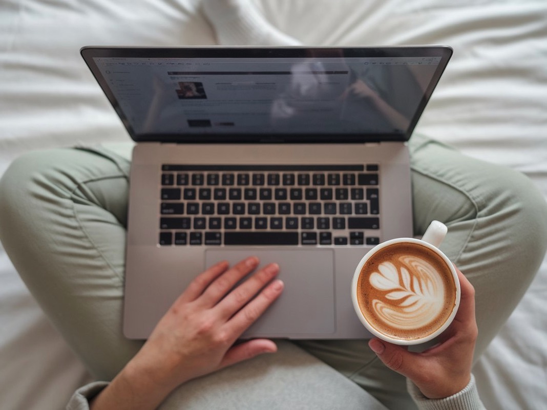 woman on bed with laptop.jpeg